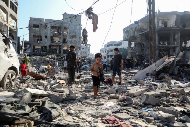 (260730) -- GAZA, July 30, 2026 (Xinhua) -- Palestinians inspect the destruction following an Israeli airstrike in Al-Shati refugee camp, west of Gaza City, on July 30, 2026. (Photo by Rizek Abdeljawad/Xinhua)