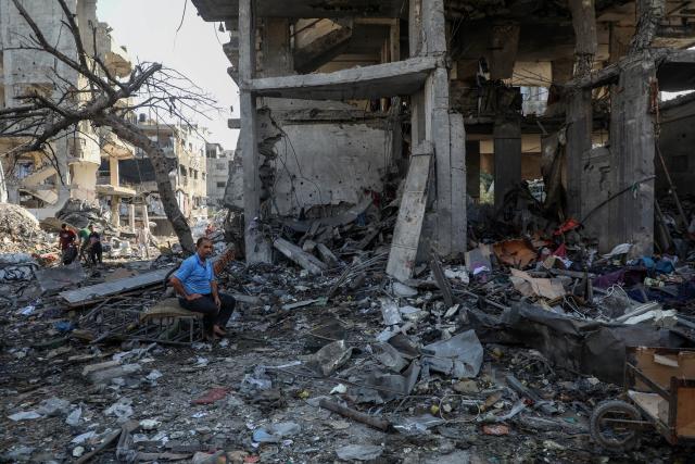 (260730) -- GAZA, July 30, 2026 (Xinhua) -- Palestinians inspect the destruction following an Israeli airstrike in Al-Shati refugee camp, west of Gaza City, on July 30, 2026. (Photo by Rizek Abdeljawad/Xinhua)