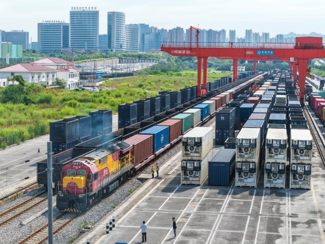 (260731) -- CHONGQING, July 31, 2026 (Xinhua) -- An aerial drone photo taken on July 30, 2026 shows a freight train of the New International Land-Sea Trade Corridor waiting for departure at Yuzui Station in Chongqing, southwest China. A total of 961 rail freight train trips were operated from Chongqing via the New International Land-Sea Trade Corridor in the first half of the year, up 25.6 percent year on year, according to the logistics division of China Railway Chengdu Group Co., Ltd. 
  Chongqing's imports and exports via the corridor amounted to 28.71 billion yuan (about 4.25 billion U.S. dollars) during the same period, rising 13.7 percent year on year, according to data from Chongqing Customs. (Xinhua/Tang Yi)