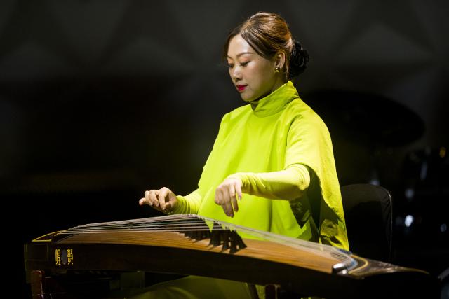 (260731) -- RIO DE JANEIRO, July 31, 2026 (Xinhua) -- A musician of the Shanghai Chinese Orchestra plays Guzheng, a traditional Chinese musical instrument also known as Chinese plucked zither, during the "Colors of China" concert in Rio de Janeiro, Brazil, July 30, 2026. The concert was staged here on Thursday, marking the start of its tour performance at six cities in Brazil. (Photo by Daniel Ramalho/Xinhua)