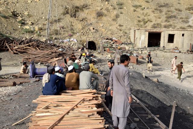 (260731) -- QUETTA, July 31, 2026 (Xinhua) -- People gather at the entrance of the coal mine site after an explosion on the outskirts of Quetta, Pakistan, July 31, 2026. Thirty-four workers trapped in a coal mine explosion in Pakistan's southwest Balochistan province were presumed dead, rescue officials said on Friday.
   The explosion occurred at around 4 p.m. local time on Thursday inside a coal mine on the outskirts of the provincial capital of Quetta, where the miners were working at the time of the incident. (Str/Xinhua)