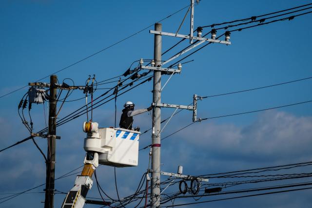 (260731) -- KUMAMOTO, July 31, 2026 (Xinhua) -- A worker checks the electrical circuit in Kumamoto Prefecture, Japan, July 30, 2026. The death toll from a powerful earthquake that struck Japan's Kumamoto Prefecture has risen to 35, the prefectural government said Friday. (Xinhua/Jia Haocheng)