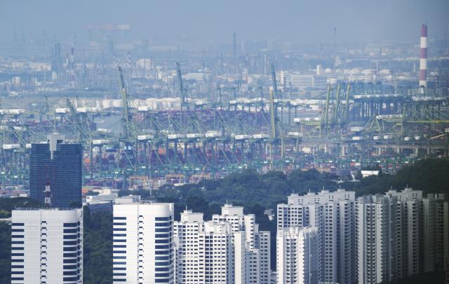 (260731) -- SINGAPORE, July 31, 2026 (Xinhua) -- This file photo taken on Jan. 14, 2026 shows a port in Singapore. The World Trade Organization (WTO) releases the latest data on July 31, 2026, which showed that global merchandise trade growth exceeded expectations in the first quarter of 2026, as surging trade in electronic components related to artificial intelligence (AI) offset the negative impact of the Middle East conflict. (Photo by Then Chih Wey/Xinhua)