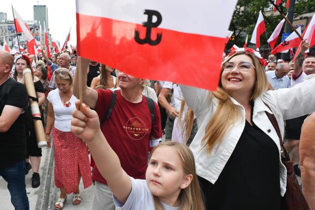 (260802) -- WARSAW, Aug. 2, 2026 (Xinhua) -- People take part in a march commemorating the 82nd anniversary of the Warsaw Uprising in Warsaw, Poland, Aug. 1, 2026. The Warsaw Uprising, which broke out on Aug. 1, 1944, was the largest underground military operation in German-occupied Europe. Around 40,000-50,000 Polish insurgents took part in the two-month struggle, which resulted in the deaths of approximately 18,000 fighters and up to 180,000 civilians. (Photo by Aleksy Witwicki/Xinhua)