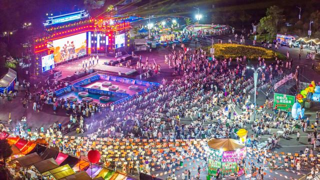 (260802) -- CHUZHOU, Aug. 2, 2026 (Xinhua) -- A drone photo taken on Aug. 1, 2026 shows a nighttime market at the Langya Mountain scenic area in Chuzhou, east China's Anhui Province. Located in the southwest of Chuzhou, the Langya Mountain scenic area is home to the renowned Zuiweng Pavilion, which was featured in a celebrated essay by Northern Song Dynasty literary figure Ouyang Xiu. In summer, the scenic area attracts visitors with daytime sightseeing and nighttime markets. (Photo by Ji Chengjun/Xinhua)