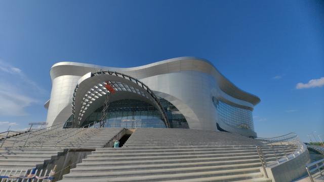 (260802) -- HARBIN, Aug. 2, 2026 (Xinhua) -- This photo taken on July 22, 2026 shows an exterior view of the joint customs and immigration inspection hall of the first cross-border ropeway linking China and Russia, in Heihe, northeast China's Heilongjiang Province. TO GO WITH "Main structure of first cross-border ropeway between China and Russia completed" (Xinhua/Wang Junbao)