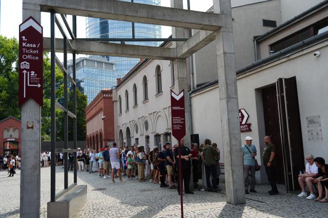 (260802) -- WARSAW, Aug. 2, 2026 (Xinhua) -- People visit the Warsaw Rising Museum during commemorative events marking the 82nd anniversary of the Warsaw Uprising in Warsaw, Poland, Aug. 1, 2026. The Warsaw Uprising, which broke out on Aug. 1, 1944, was the largest underground military operation in German-occupied Europe. Around 40,000-50,000 Polish insurgents took part in the two-month struggle, which resulted in the deaths of approximately 18,000 fighters and up to 180,000 civilians. (Xinhua/Guo Shuang)