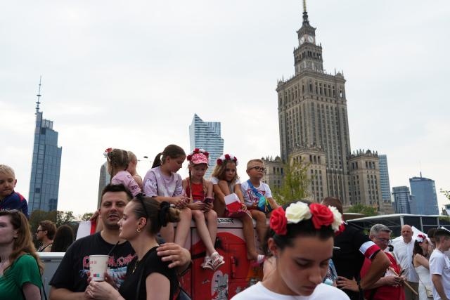 (260802) -- WARSAW, Aug. 2, 2026 (Xinhua) -- People attend a commemorative event marking the 82nd anniversary of the Warsaw Uprising in Warsaw, Poland, Aug. 1, 2026. The Warsaw Uprising, which broke out on Aug. 1, 1944, was the largest underground military operation in German-occupied Europe. Around 40,000-50,000 Polish insurgents took part in the two-month struggle, which resulted in the deaths of approximately 18,000 fighters and up to 180,000 civilians. (Xinhua/Guo Shuang)