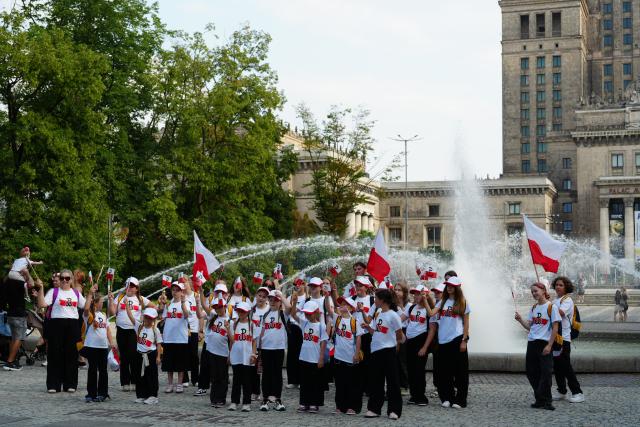 (260802) -- WARSAW, Aug. 2, 2026 (Xinhua) -- Young people attend a commemorative event marking the 82nd anniversary of the Warsaw Uprising in Warsaw, Poland, Aug. 1, 2026. The Warsaw Uprising, which broke out on Aug. 1, 1944, was the largest underground military operation in German-occupied Europe. Around 40,000-50,000 Polish insurgents took part in the two-month struggle, which resulted in the deaths of approximately 18,000 fighters and up to 180,000 civilians. (Xinhua/Yue Yuanyuan)