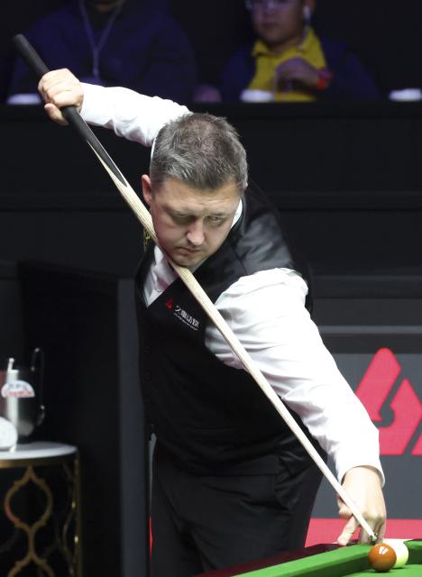 (260802) -- SHANGHAI, Aug. 2, 2026 (Xinhua) -- Kyren Wilson competes during the final match between Judd Trump of England and Kyren Wilson of England at the World Snooker Shanghai Masters 2026 in Shanghai, east China, Aug. 2, 2026. (Xinhua/Chen Haoming)