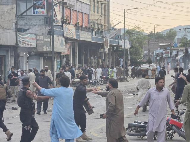 (260802) -- ISLAMABAD, Aug. 2, 2026 (Xinhua) -- Photo taken with a mobile phone on Aug. 2, 2026 shows the blast site in Khyber Pakhtunkhwa province, Pakistan. The death toll from a suicide blast near a peace rally in Pakistan's northwestern Khyber Pakhtunkhwa province has risen to 14, while 26 others were injured, police sources told Xinhua on Sunday. (Str/Xinhua)