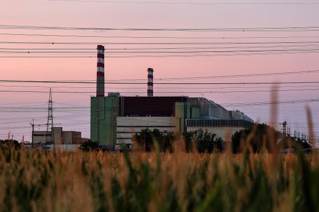 (260803) -- BUDAPEST, Aug. 3, 2026 (Xinhua) -- This photo taken on Aug. 2, 2026 shows a view of the Paks nuclear power plant near Dunaszentbenedek, Hungary. Hungary is entering its "most critical 5 days" as dropping water levels on the Danube River threaten the complete shutdown of the Paks nuclear power plant amid an extreme heatwave, Hungary's Prime Minister Peter Magyar said on Sunday, warning that the plant could be shut down for more than a month. (Photo by David Balogh/Xinhua)