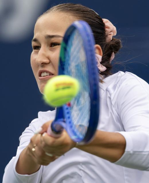 (260803) -- TORONTO, Aug. 3, 2026 (Xinhua) -- Kamilla Rakhimova of Uzbekistan returns the ball during the first round of the women's singles match between Kamilla Rakhimova of Uzbekistan and Venus Williams of the United States at the 2026 National Bank Open tennis tournament in Toronto, Canada, Aug. 2, 2026. (Photo by Zou Zheng/Xinhua)