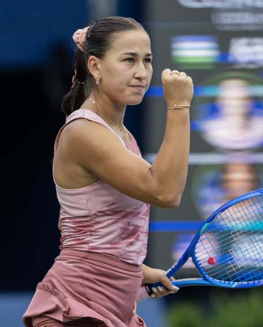 (260803) -- TORONTO, Aug. 3, 2026 (Xinhua) -- Kamilla Rakhimova of Uzbekistan celebrates a point during the first round of the women's singles match between Kamilla Rakhimova of Uzbekistan and Venus Williams of the United States at the 2026 National Bank Open tennis tournament in Toronto, Canada, Aug. 2, 2026. (Photo by Zou Zheng/Xinhua)