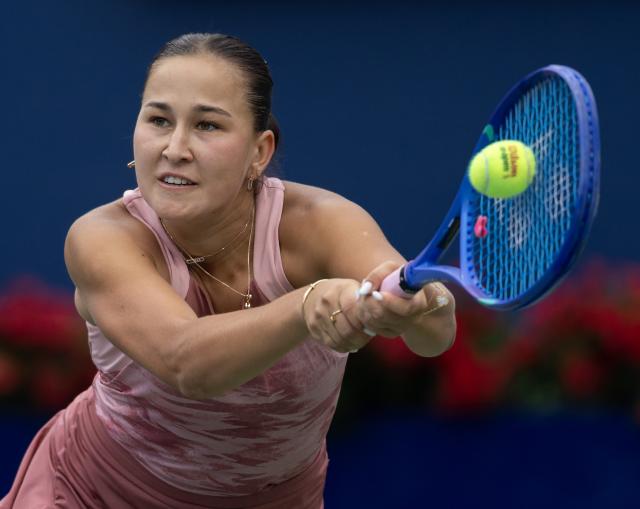 (260803) -- TORONTO, Aug. 3, 2026 (Xinhua) -- Kamilla Rakhimova of Uzbekistan returns the ball during the first round of the women's singles match between Kamilla Rakhimova of Uzbekistan and Venus Williams of the United States at the 2026 National Bank Open tennis tournament in Toronto, Canada, Aug. 2, 2026. (Photo by Zou Zheng/Xinhua)