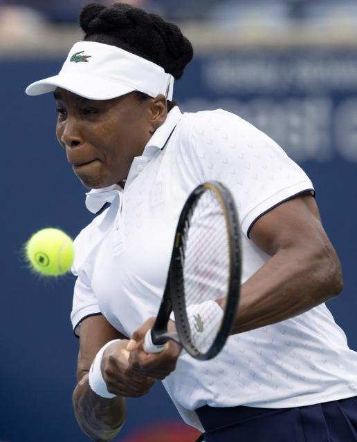 (260803) -- TORONTO, Aug. 3, 2026 (Xinhua) -- Venus Williams of the United States returns the ball during the first round of the women's singles match between Kamilla Rakhimova of Uzbekistan and Venus Williams of the United States at the 2026 National Bank Open tennis tournament in Toronto, Canada, Aug. 2, 2026. (Photo by Zou Zheng/Xinhua)