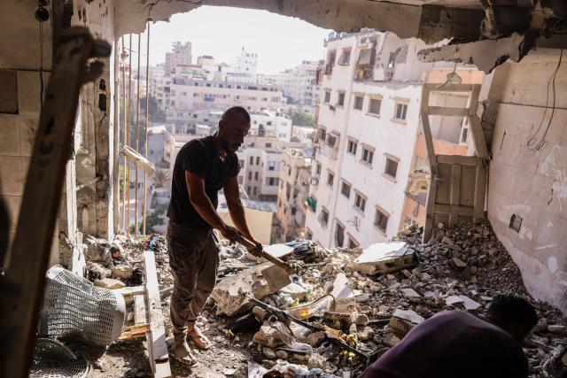 (260803) -- GAZA, Aug. 3, 2026 (Xinhua) -- Palestinians check the ruins after an Israeli airstrike hit an apartment in Gaza City, on Aug. 2, 2026. At least 18 Palestinians were killed in Israeli airstrikes on the Gaza Strip since dawn on Sunday, despite announcements of progress in efforts to implement a ceasefire agreement.
  The strikes targeted residential apartments, tents sheltering displaced people, civilian vehicles, and Palestinian gatherings from the north to the south of the Gaza Strip, resulting in the deaths of at least 18 people, including four children and two women, said Mahmoud Basal, spokesperson for the Civil Defense in Gaza. (Photo by Rizek Abdeljawad/Xinhua)