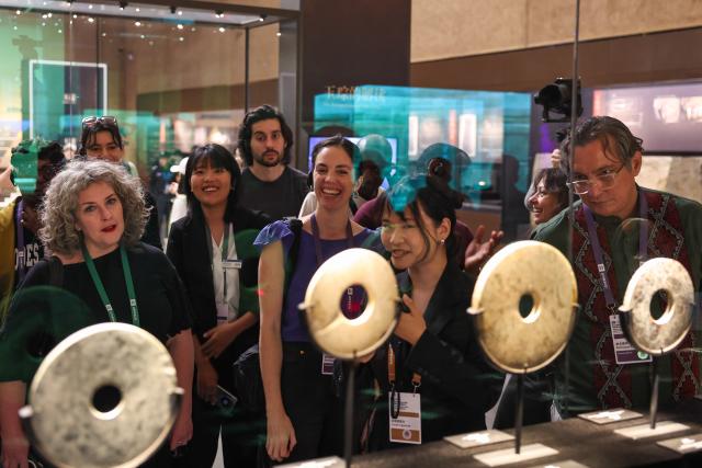 (260803) -- HANGZHOU, Aug. 3, 2026 (Xinhua) -- Guests attending the third UNESCO High-Level Forum for Museums visit the Liangzhu Museum in Hangzhou, east China's Zhejiang Province, on April 23, 2025. (Xinhua/Jiang Han)