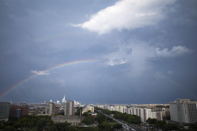 (260803) -- BEIJING, Aug. 3, 2026 (Xinhua) -- Rainbows appear in the sky after rain in Beijing, capital of China, Aug. 3, 2026. (Xinhua/Zhang Xiaoyu)