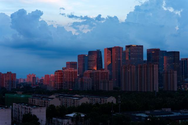 (260803) -- BEIJING, Aug. 3, 2026 (Xinhua) -- This photo taken on Aug. 3, 2026 shows a view of the Lize Financial Business District after rain in Beijing, capital of China. (Xinhua/Zhang Xiaoyu)