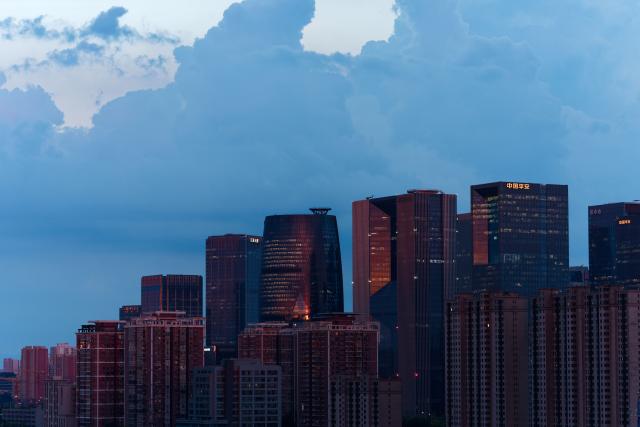 (260803) -- BEIJING, Aug. 3, 2026 (Xinhua) -- This photo taken on Aug. 3, 2026 shows a view of the Lize Financial Business District after rain in Beijing, capital of China. (Xinhua/Zhang Xiaoyu)