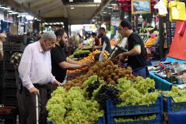 (260803) -- ANKARA, Aug. 3, 2026 (Xinhua) -- People shop at a local bazaar in Ankara, Türkiye, on Aug. 3, 2026. Türkiye's consumer prices edged up 1.78 percent in July, up from a 0.99 percent rise in June, slightly slowing annual inflation to 31.75 percent due to favorable base effects, the Turkish Statistical Institute announced Monday. (Photo by Mustafa Kaya/Xinhua)