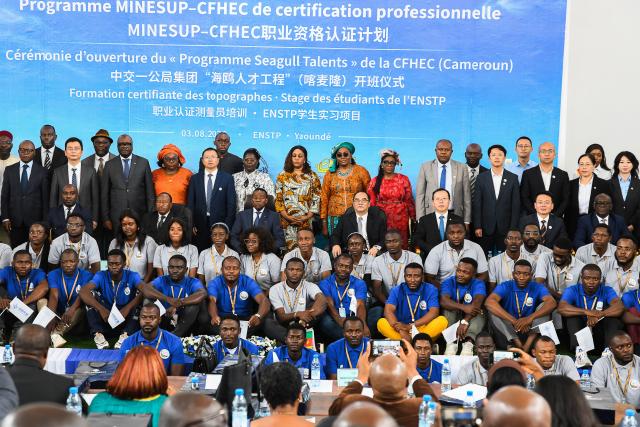 (260803) -- YAOUNDE, Aug. 3, 2026 (Xinhua) -- Guests take a group photo with program student trainees after the launching ceremony in Yaounde, Cameroon, Aug. 3, 2026. China First Highway Engineering Co., Ltd. (CFHEC) launched a training initiative Monday to build local expertise in Cameroon. The Seagull Talent Program was launched in the capital, Yaounde, with senior Cameroonian government officials, Chinese diplomats, faculty from the National Advanced School of Public Works (ENSTP), and the trainees in attendance. The 10-day course brings together 54 participants, including 24 local project staff and 30 ENSTP students. (Xinhua/Kepseu)