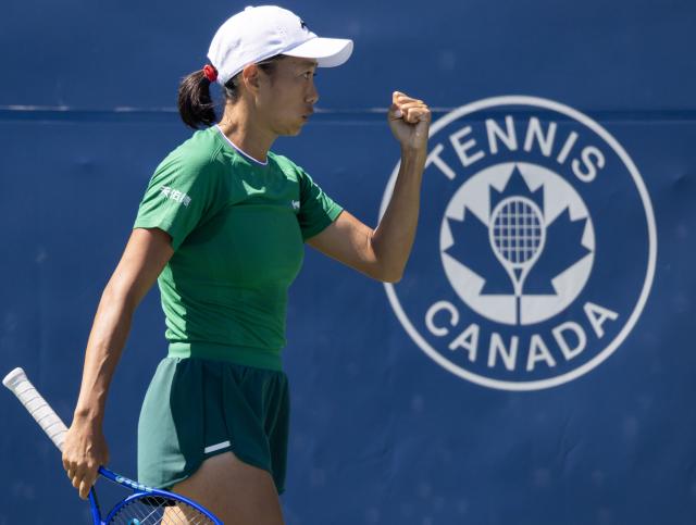 (260804) -- TORONTO, Aug. 4, 2026 (Xinhua) -- Zhang Shuai of China celebrates scoring during the first round of the women's singles match between Yulia Putintseva of Kazakhstan and Zhang Shuai of China at the 2026 National Bank Open tennis tournament in Toronto, Canada, on Aug. 3, 2026. (Photo by Zou Zheng/Xinhua)