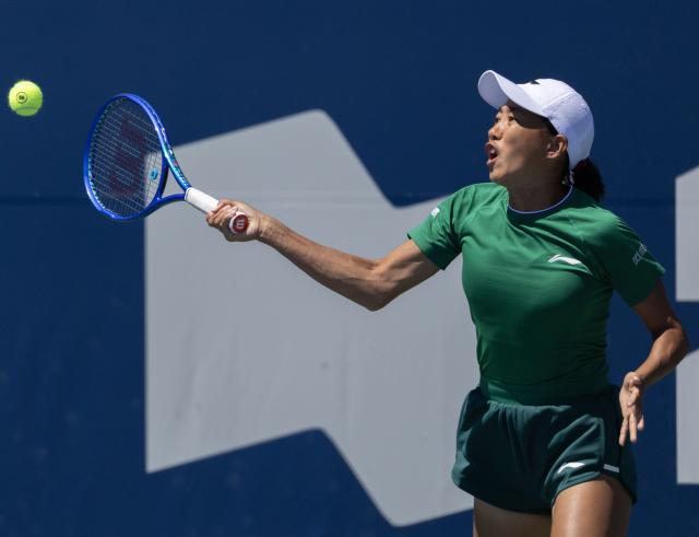 (260804) -- TORONTO, Aug. 4, 2026 (Xinhua) -- Zhang Shuai of China returns the ball during the first round of the women's singles match between Yulia Putintseva of Kazakhstan and Zhang Shuai of China at the 2026 National Bank Open tennis tournament in Toronto, Canada, on Aug. 3, 2026. (Photo by Zou Zheng/Xinhua)