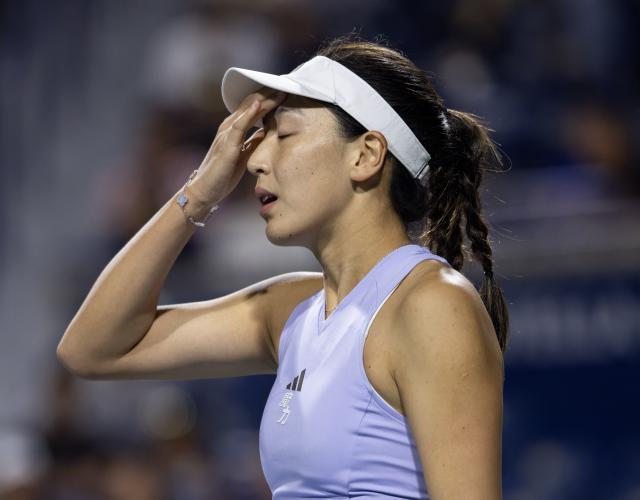 (260804) -- TORONTO, Aug. 4, 2026 (Xinhua) -- Wang Xinyu of China reacts during the first round of the women's singles match between Wang Xinyu of China and Daria Kasatkina of Australia at the 2026 National Bank Open tennis tournament in Toronto, Canada, Aug. 3, 2026. (Photo by Zou Zheng/Xinhua)