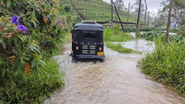 (260804) -- NUWARA ELIYA, Aug. 4, 2026 (Xinhua) -- This screenshot from a video clip taken on Aug. 3, 2026 shows an inundated street in Nuwara Eliya, Sri Lanka. At least six people have died due to adverse weather conditions currently affecting Sabaragamuwa Province and Kandy and Nuwara Eliya districts in central Sri Lanka, local police said Tuesday. (Photo by Gayan Sameera/Xinhua)