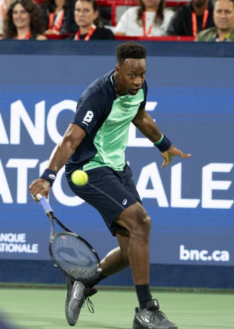 (260804) -- MONTREAL, Aug. 4, 2026 (Xinhua) -- Gael Monfils of France hits a return against Kamil Majchrzak of Poland during the men's singles first round match at the 2026 National Bank Open tennis tournament in Montreal, Canada, Aug. 3, 2026. (Photo by Li Haitao/Xinhua)