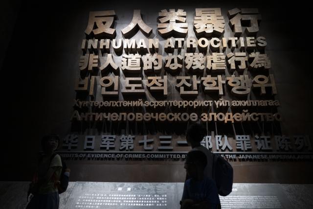 (260804) -- HARBIN, Aug. 4, 2026 (Xinhua) -- People visit the Exhibition Hall of Evidences of Crime Committed by Unit 731 of the Japanese Imperial Army in Pingfang District of Harbin, northeast China's Heilongjiang Province, Aug. 4, 2026. During the summer vacation, the Exhibition Hall of Evidences of Crime Committed by Unit 731 of the Japanese Imperial Army has greeted lots of visitors. 
   People tour the exhibition hall to view archival evidence exposing the germ warfare crimes perpetrated by notorious Japanese Unit 731 during World War II. 
   Unit 731 was a top-secret biological and chemical warfare research base established as the nerve center for Japanese biological warfare in China and Southeast Asia during WWII. At least 3,000 people were used in human experiments conducted by Unit 731, and more than 300,000 people in China were killed by Japan's biological weapons. (Xinhua/Zhang Tao)