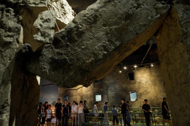 (260804) -- HARBIN, Aug. 4, 2026 (Xinhua) -- People visit the Exhibition Hall of Evidences of Crime Committed by Unit 731 of the Japanese Imperial Army in Pingfang District of Harbin, northeast China's Heilongjiang Province, Aug. 4, 2026. During the summer vacation, the Exhibition Hall of Evidences of Crime Committed by Unit 731 of the Japanese Imperial Army has greeted lots of visitors. 
   People tour the exhibition hall to view archival evidence exposing the germ warfare crimes perpetrated by notorious Japanese Unit 731 during World War II. 
   Unit 731 was a top-secret biological and chemical warfare research base established as the nerve center for Japanese biological warfare in China and Southeast Asia during WWII. At least 3,000 people were used in human experiments conducted by Unit 731, and more than 300,000 people in China were killed by Japan's biological weapons. (Xinhua/Zhang Tao)