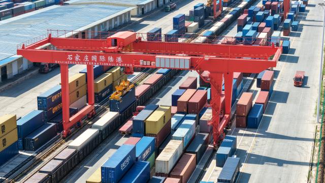 (260804) -- SHIJIAZHUANG, Aug. 4, 2026 (Xinhua) -- This aerial drone photo taken on Aug. 4, 2026 shows a container loading site of the Shijiazhuang international land port in north China's Hebei Province. Shijiazhuang international land port in north China's Hebei Province handled a total of 814 China-Europe and China-Central Asia freight train trips in the first half of 2026, up 42.06 percent year on year. (Photo by Liang Zidong/Xinhua)