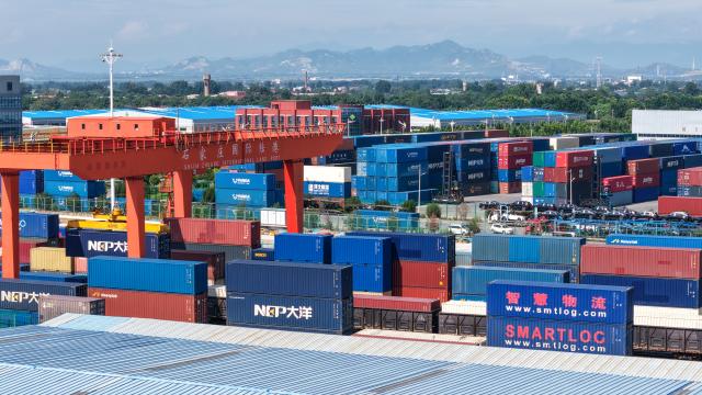 (260804) -- SHIJIAZHUANG, Aug. 4, 2026 (Xinhua) -- This drone photo taken on Aug. 4, 2026 shows a container loading site of the Shijiazhuang international land port in north China's Hebei Province. Shijiazhuang international land port in north China's Hebei Province handled a total of 814 China-Europe and China-Central Asia freight train trips in the first half of 2026, up 42.06 percent year on year. (Photo by Liang Zidong/Xinhua)