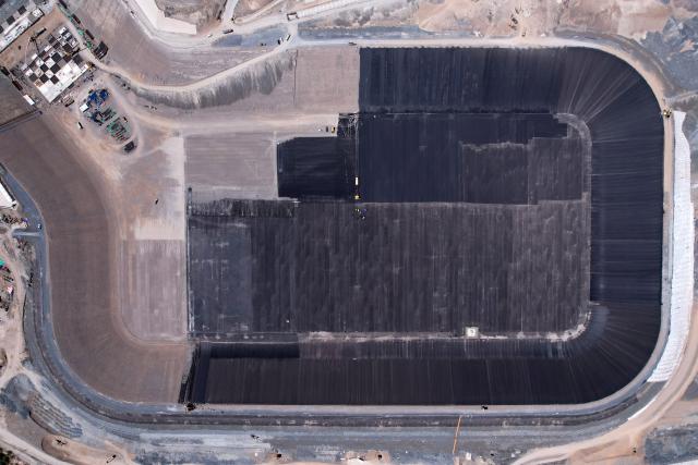 (260804) -- ZHANGYE, Aug. 4, 2026 (Xinhua) -- An aerial drone photo shows the construction site of a pumped-storage power station in Zhangye, northwest China's Gansu Province, Aug. 4, 2026. The construction of the power station started in 2022, and all the four 350,000-kW reversible pump-turbine units are expected to be fully put into operation by 2029. (Xinhua/Liu Keying)