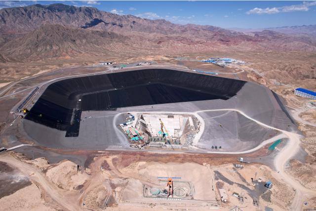 (260804) -- ZHANGYE, Aug. 4, 2026 (Xinhua) -- An aerial drone photo shows the construction site of a pumped-storage power station in Zhangye, northwest China's Gansu Province, Aug. 4, 2026. The construction of the power station started in 2022, and all the four 350,000-kW reversible pump-turbine units are expected to be fully put into operation by 2029. (Xinhua/Fan Peishen)