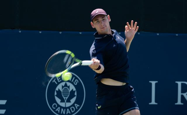 (260805) -- MONTREAL, Aug. 5, 2026 (Xinhua) -- Valentin Royer of France competes against Pablo Carreno Busta of Spain during the men's singles first round match at the 2026 National Bank Open tennis tournament in Montreal, Canada, Aug. 4, 2026. (Photo by Li Haitao/Xinhua)