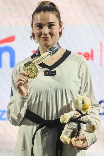 (260805) -- JAKARTA, Aug. 5, 2026 (Xinhua) -- Gold medalist Reba Stewart of Australia poses at the awarding ceremony for the women's Kyorugi +73kg final match of Taekwondo at the 8th Asian Taekwondo Indonesia Open Championships 2026 in Jakarta, Indonesia, Aug. 4, 2026. (Xinhua/Agung Kuncahya B.)