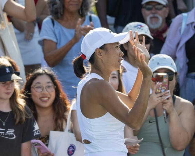 (260805) -- TORONTO, Aug. 5, 2026 (Xinhua) -- Zhang Shuai (front) of China celebrates victory after the second round of the women's singles match between Zhang Shuai of China and Jelena Ostapenko of Latvia at the 2026 National Bank Open tennis tournament in Toronto, Canada, on Aug. 4, 2026. (Photo by Zou Zheng/Xinhua)