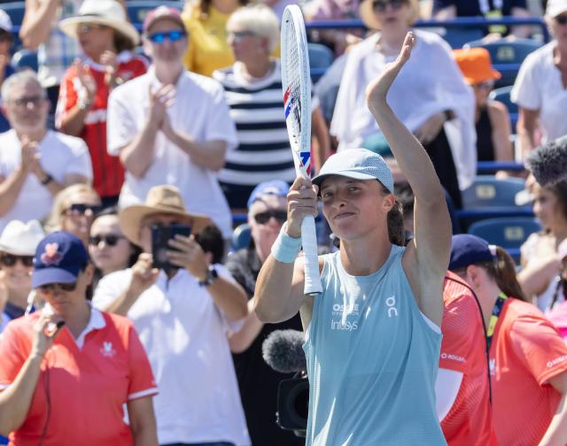 (260805) -- TORONTO, Aug. 5, 2026 (Xinhua) -- Iga Swiatek of Poland celebrates victory after the second round of the women's singles match between Sara Bejlek of the Czech Republic and Iga Swiatek of Poland at the 2026 National Bank Open tennis tournament in Toronto, Canada, on Aug. 4, 2026. (Photo by Zou Zheng/Xinhua)