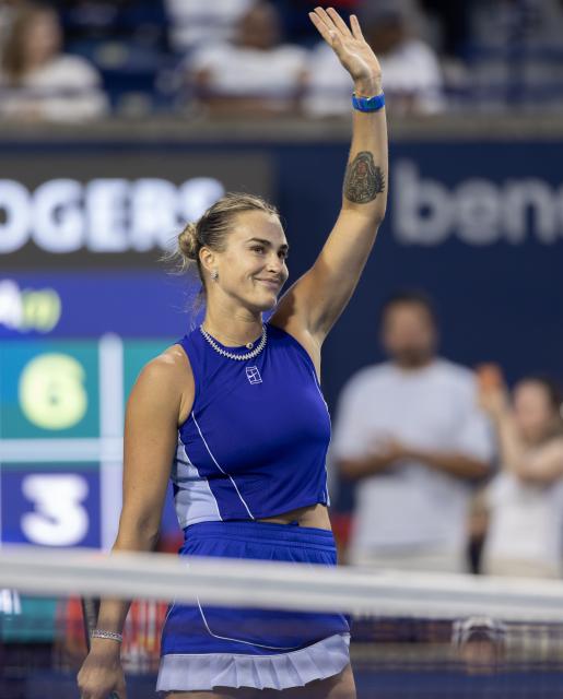 (260805) -- TORONTO, Aug. 5, 2026 (Xinhua) -- Aryna Sabalenka of Belarus celebrates after winning the second round of the women's singles match between Aryna Sabalenka of Belarus and Uchijima Moyuka of Japan at the 2026 National Bank Open tennis tournament in Toronto, Canada, on Aug. 4, 2026. (Photo by Zou Zheng/Xinhua)
