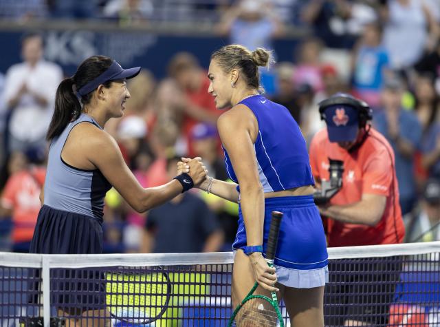 (260805) -- TORONTO, Aug. 5, 2026 (Xinhua) -- Aryna Sabalenka (R) of Belarus shakes hands with Uchijima Moyuka of Japan after the second round of the women's singles match at the 2026 National Bank Open tennis tournament in Toronto, Canada, on Aug. 4, 2026. (Photo by Zou Zheng/Xinhua)