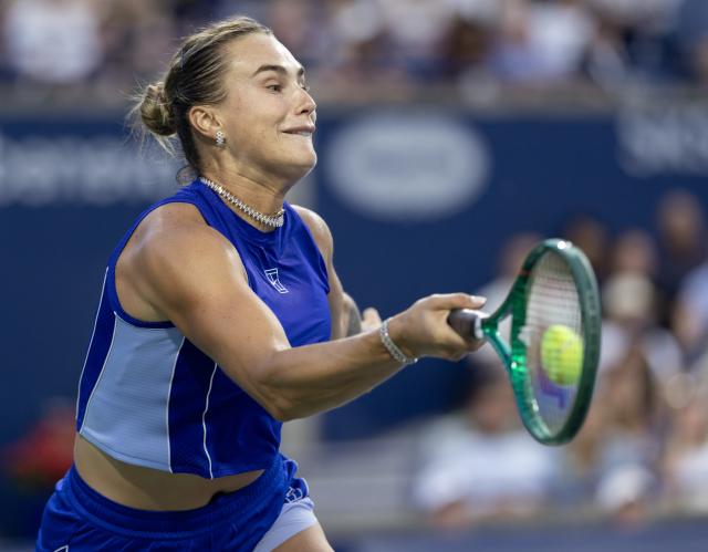 (260805) -- TORONTO, Aug. 5, 2026 (Xinhua) -- Aryna Sabalenka of Belarus hits a return during the second round of the women's singles match between Aryna Sabalenka of Belarus and Uchijima Moyuka of Japan at the 2026 National Bank Open tennis tournament in Toronto, Canada, on Aug. 4, 2026. (Photo by Zou Zheng/Xinhua)