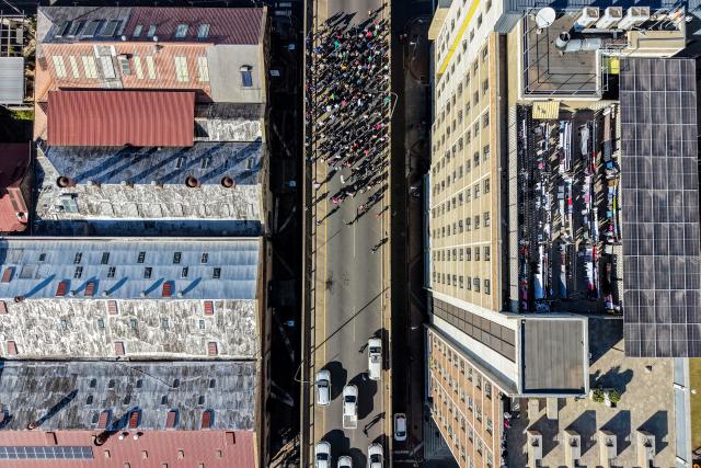 (260805) -- JOHANNESBURG, Aug. 5, 2026 (Xinhua) -- An aerial drone photo taken on June 30, 2026 shows protesters marching during a massive demonstration against illegal immigration in Johannesburg, South Africa. TO GO WITH "News Analysis: South Africa's anti-immigration protests persist as divisions expose deeper governance challenges" (Photo by Shiraaz Mohamed/Xinhua)