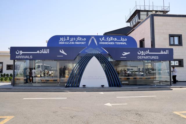 (260805) -- DEIR AL-ZOUR, Aug. 5, 2026 (Xinhua) -- This photo taken on Aug. 5, 2026 shows the entrance of Deir al-Zour International Airport in Deir al-Zour province, eastern Syria. The first direct commercial flight from Kuwait landed Wednesday at Deir al-Zour International Airport in eastern Syria, marking the return of international commercial air services to the airport after more than a decade. (Str/Xinhua)