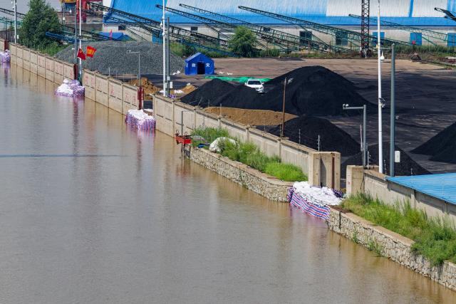 (260806) -- HARBIN, Aug. 6, 2026 (Xinhua) -- An aerial drone photo taken on Aug. 6, 2026 shows the dock sealed off with sandbags at a port company in flood-affected Tongjiang City, northeast China's Heilongjiang Province. Flood prevention measures have been implemented across northeast China's Heilongjiang Province, which has entered its main flood season.
  China has earmarked 50 million yuan (about 7.36 million U.S. dollars) in central government funds to support post-disaster recovery in flood-hit Heilongjiang Province in the northeast, the National Development and Reform Commission (NDRC) said Tuesday. (Xinhua/Zhang Tao)