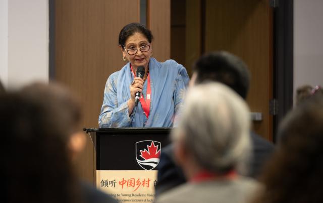 (260806) -- OTTAWA, Aug. 6, 2026 (Xinhua) -- President of the International Board on Books for Young People (IBBY) Basarat Kazim speaks at the opening ceremony of an exhibition titled "Listening to Young Readers: Voices from Rural China" in Ottawa, Canada, Aug. 5, 2026. TO GO WITH "China's rural reading efforts showcased at exhibition in Canada" (Photo by Li Haitao/Xinhua)