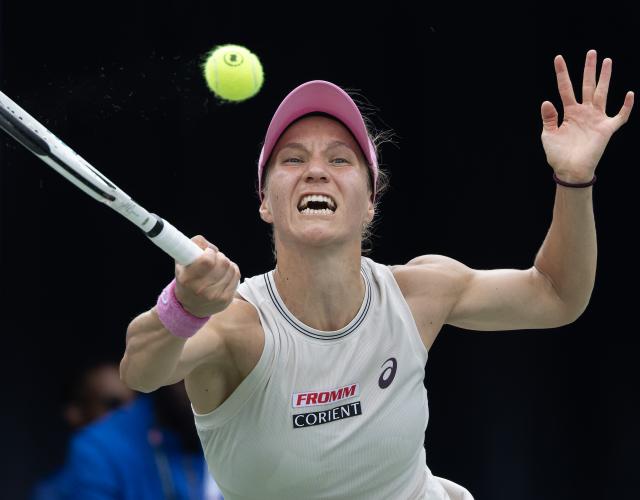 (260807) -- TORONTO, Aug. 7, 2026 (Xinhua) -- Viktorija Golubic of Switzerland returns the ball during the third round of the women's singles match between Viktorija Golubic of Switzerland and Iga Swiatek of Poland at the 2026 National Bank Open tennis tournament in Toronto, Canada, on Aug. 6, 2026. (Photo by Zou Zheng/Xinhua)